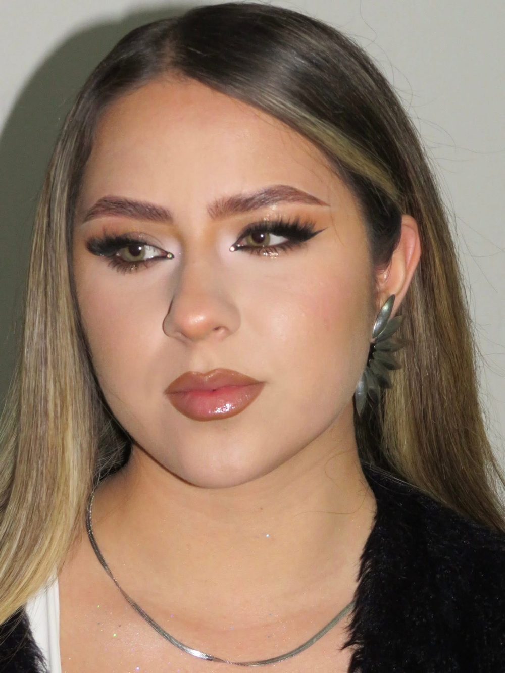 Warm brown soft glam with winged liner and nude gloss